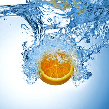 water splash on blue backgroundの写真素材