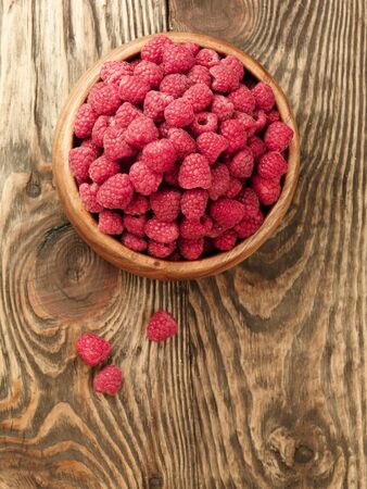 Raspberry on wood background selective focus  Fresh organic food の写真素材