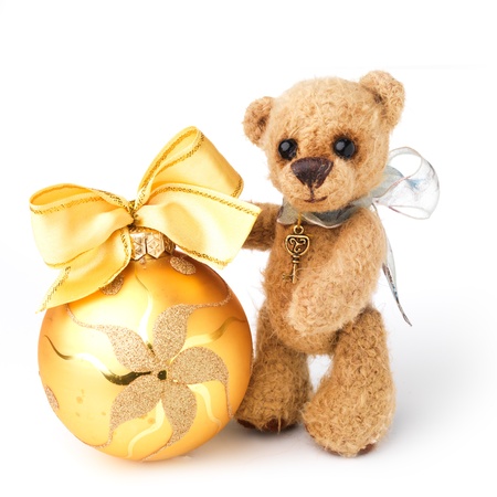 Teddy bear in classic vintage style with christmas toyの写真素材