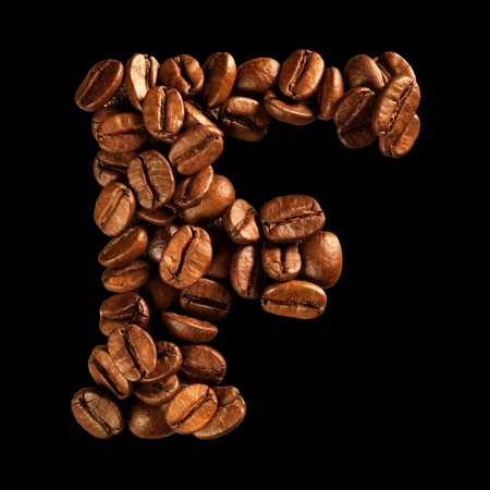 Coffee alphabet letter isolated on blackの写真素材