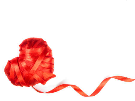 heart made of red ribbonの写真素材