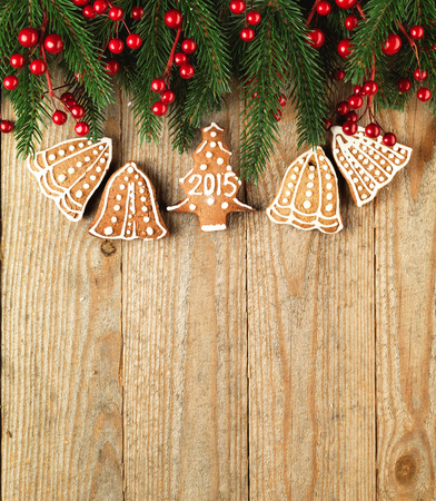 Christmas fir tree with decoration on a wooden board.の写真素材