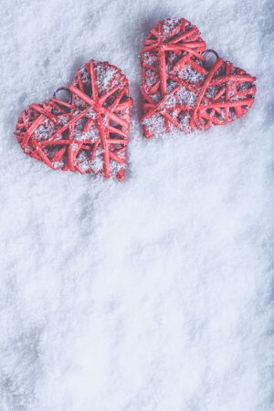 Two beautiful romantic vintage red hearts together on a white snow winter background. Love and St. Valentines Day concept.&amp;amp;#xA;&amp;amp;#xA;の写真素材