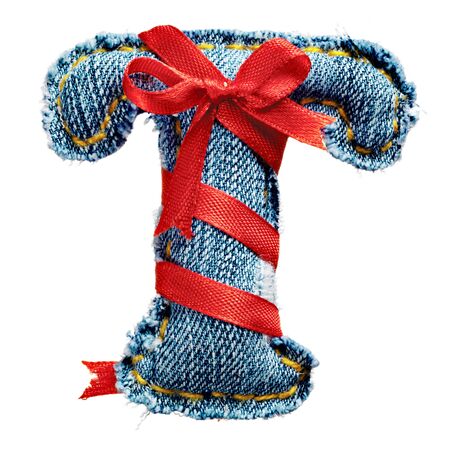 Magic holiday jeans alphabet letter T with red ribbonの写真素材