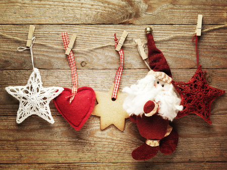 Festive Christmas decoration over wooden board background.の写真素材