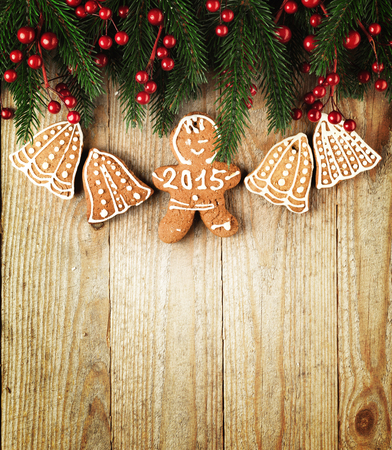 Christmas fir tree with decoration on a wooden board.の写真素材