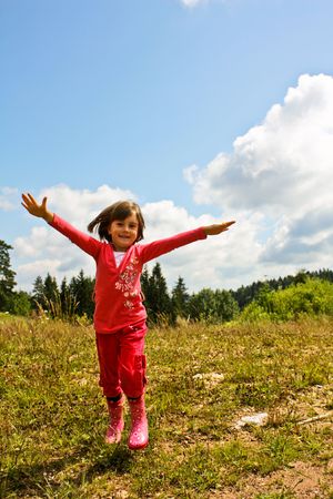 Children playing in nature, enjoying in the forestの写真素材