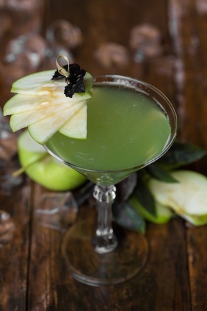 Apple Martini in glasses on wooden backgroundの写真素材