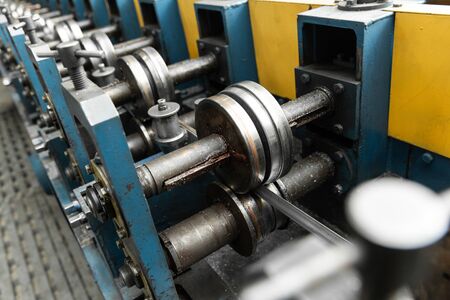 Detail of stainless steel pipe bending machine. Close up.