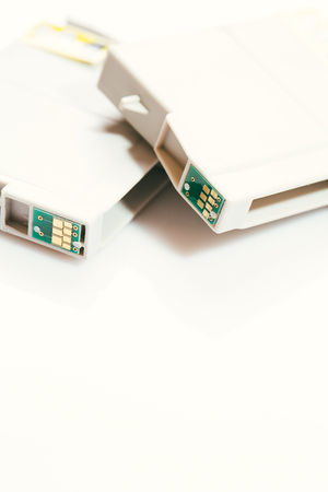 printer gray cartridges on a white background.の写真素材
