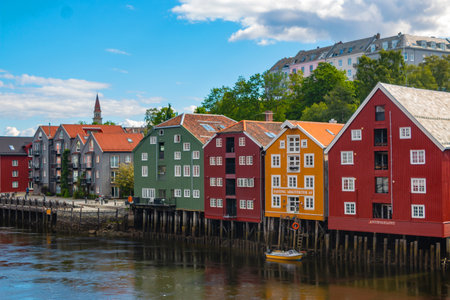 Historical Old Timber Buildings (Norwegian: Gamle Bybro or Bybroa) over the river Nidelva in...