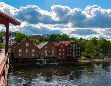 Historical Old Timber Buildings (Norwegian: Gamle Bybro or Bybroa) over the river Nidelva in Trondheimの写真素材