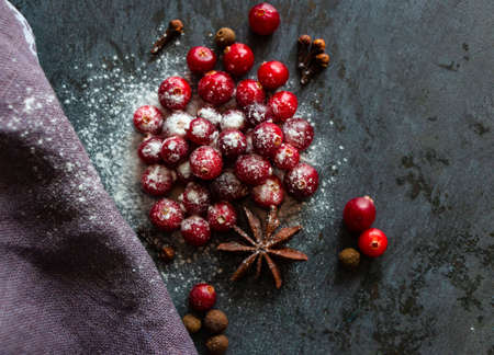 Red cranberries with mulled wine spices for Christmas and New Year recipes
