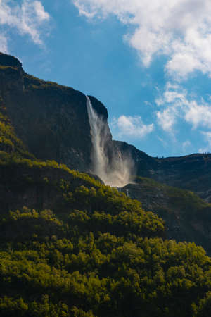 Amazing beautiful view of the Aurlandsfjord in Norway Scandinavia with green mountains and waterfall