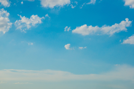 Clear blue sky and cloud backgroundの写真素材