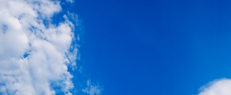 Beautiful cloudy blue sky during the day in summerの写真素材
