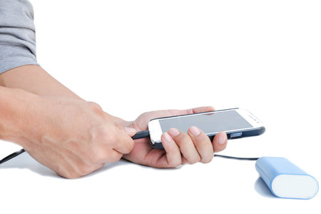 Hand man is holding smart -phone with power blank on white backgroundの写真素材