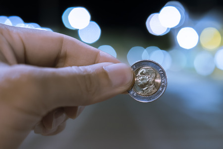 Thailand money is ten baht, the background is bokeh.の写真素材