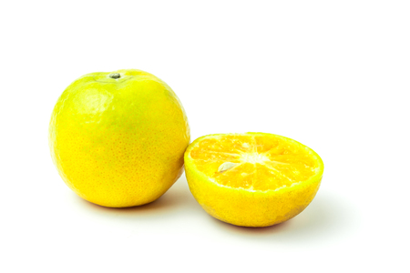 fresh oranges full and half cut Rich in vitamin C isolated on white backgroundの写真素材