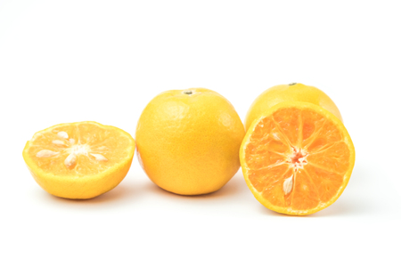 fresh oranges full and half cut Rich in vitamin C isolated on white background and clipping pathの写真素材