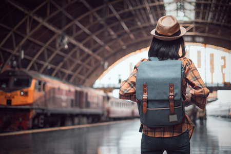 asian woman tourist traveller backpack to train station. at Hua Lamphong Station Bangkok Thailand.の写真素材