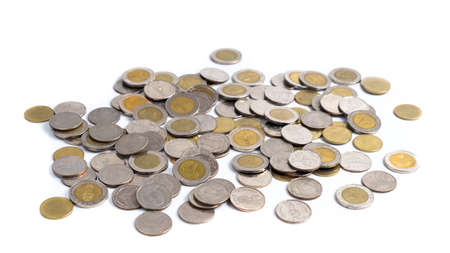A collection of Thai  baht coins on a white background. This coin is denominated in Thai baht.の写真素材