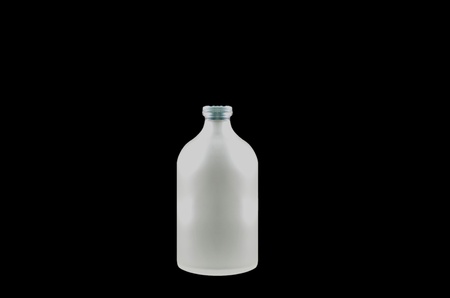 Beautiful turbid Bottle on dark background の写真素材