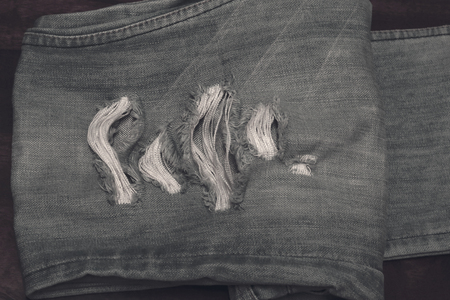 denim jeans blue old torn of fashion design.の写真素材