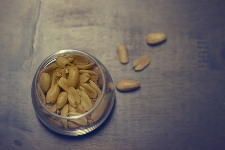 nuts beans in the glass bowl for background texture.の写真素材