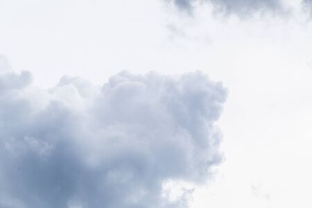 Overcast and Dark sky clouds backgroundの写真素材