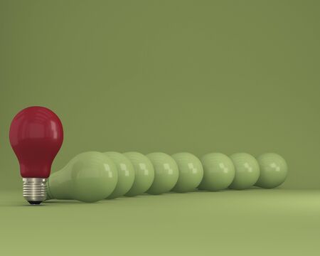 Row of light bulbs red one different idea from the others on green background, Minimal concept idea.