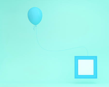 Outstanding blue balloon floating with picture frame on blue pastel background. minimal concept...