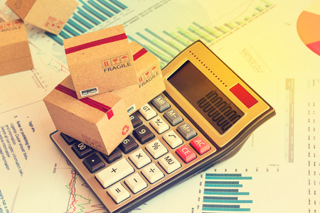 Three small boxes on a calculator.の写真素材