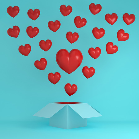 Outstanding red heart creative idea outside the box on blue pastel background.  Idea illustration of...