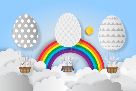 Creative ideas of Easter day with rabbit in balloon egg floating over clouds in sky. paper art and digital craft style. vector Illustrationのイラスト素材