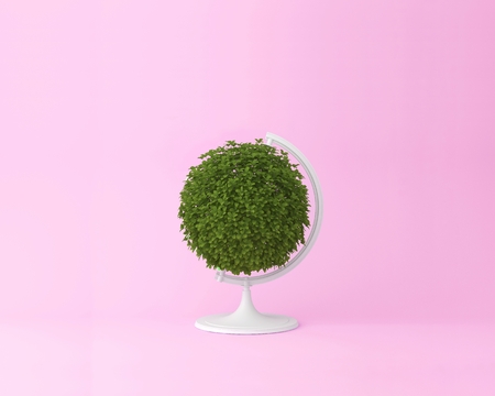 Globe sphere orb plant concept on pastel pink background. minimal idea nature. An idea creative to artwork design or World environment day concept の写真素材