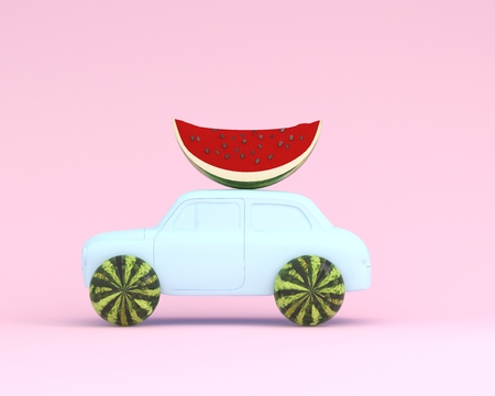 watermelon wheel and car blue on pastel pink background. minimal idea food and fruit concept. Idea creative to produce work within an advertising marketing communications. Business conceptの写真素材