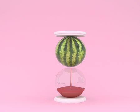 Creative made of watermelon hourglass on pink color background. minimal idea business concept. food...