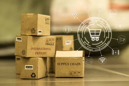 Shopping online, e-commerce concept: cardboard boxes products in warehouse. depicts of International...