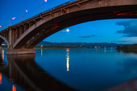 Evening bridge over the riverの写真素材