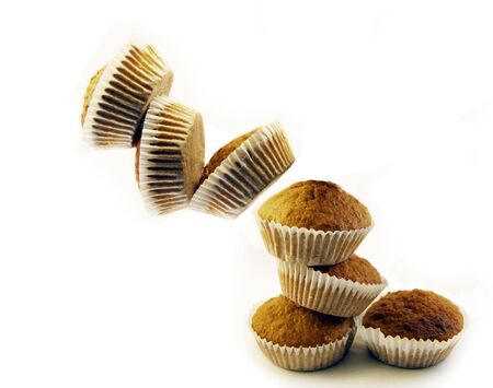 Coconut Cakes Falling shot on a white backgroundの写真素材