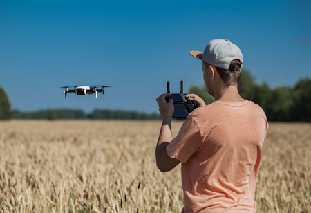 guy controls the droneの写真素材