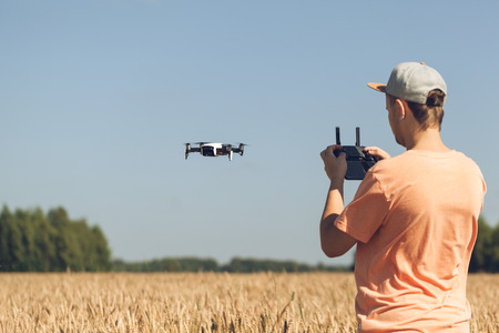 guy controls the droneの写真素材
