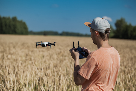 guy controls the droneの写真素材