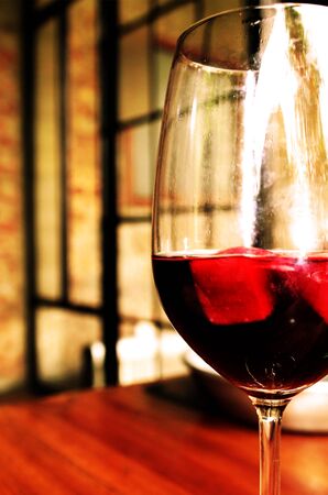 glass of wine at a restaurantの写真素材