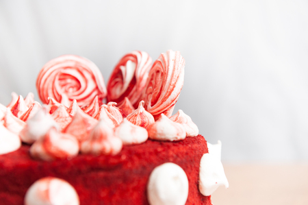 cake red velvet, white meringue decoration, close-up shot, holiday idea, cafe symbol, on a white background, vintageの写真素材