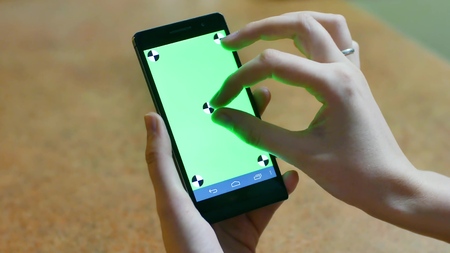 Womans hands using a Smart phone Touchscreen CHROMA KEY Close-up , Fingers make gestures touching...