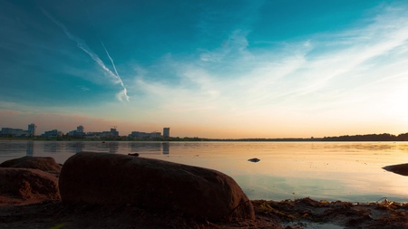 4K sunset beautiful summer landscape with cloudy sky and natural lakeの写真素材