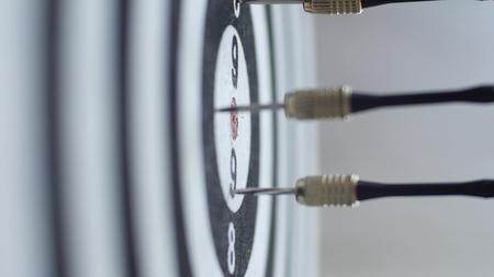 Dart hitting bulls eye, single shot bulls-eye. Concept of successful business ideas hitting the...