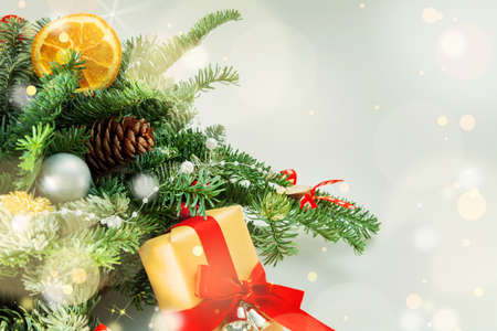 Christmas table decoration banner. Green fir branches candle gift boxes blue balls lights isolated white background. Minimalist home new year decor old style. Xmas concept copy space mock up bannerの写真素材